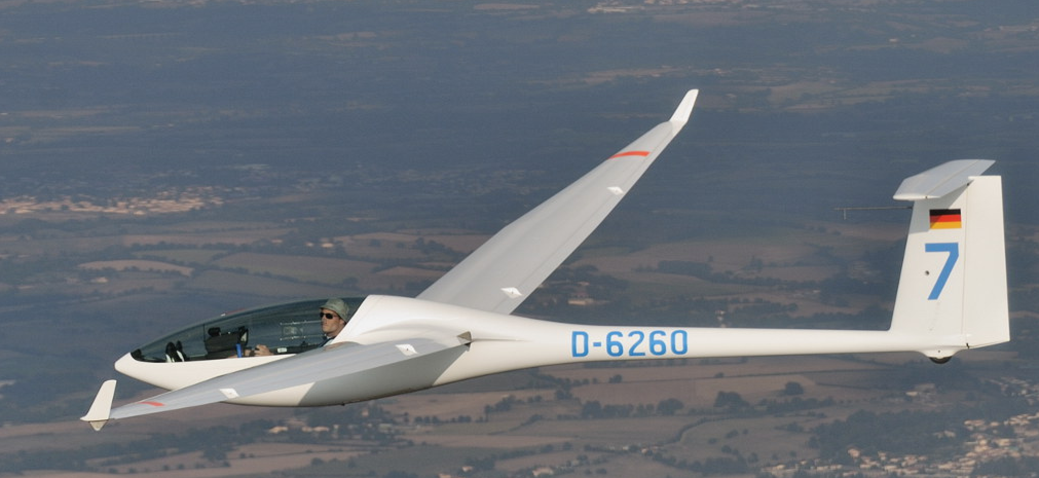 \includegraphics[width=9.75cm,height=4cm]{aeroimages/flutter0.png}